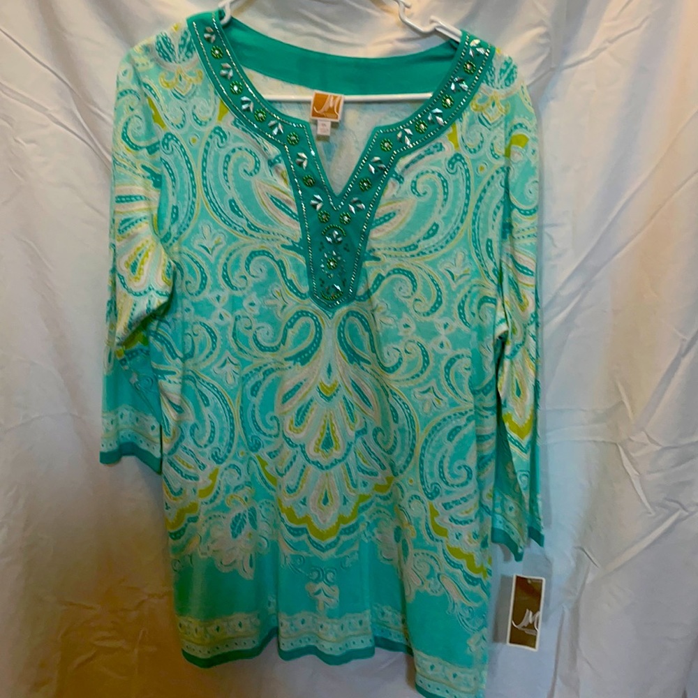 Woman’s size 0X JM collection from Macy. Beautiful and bright for summer.